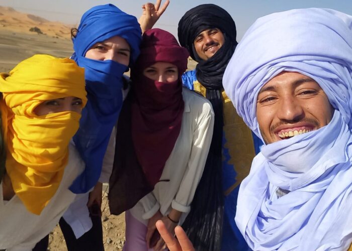 Merzouga Sahara desert camel trek Erg Chebbi dunes Morocco sunset tour