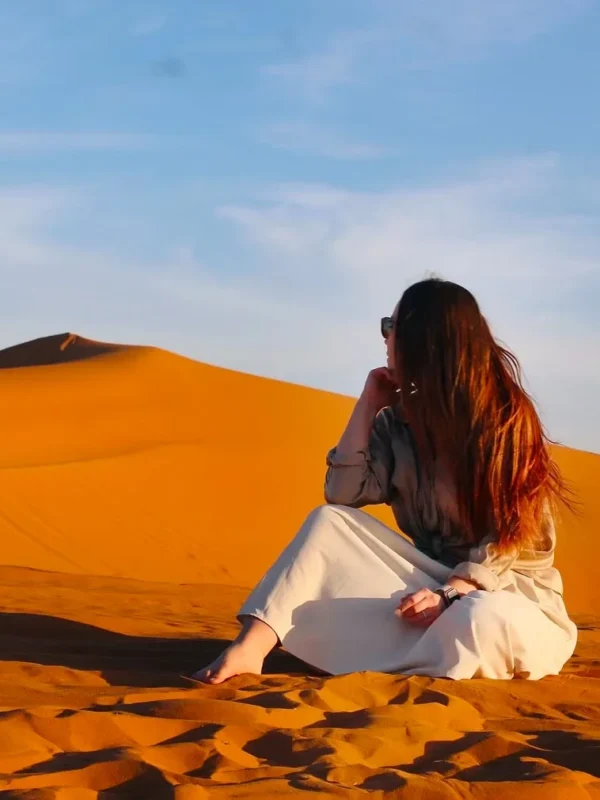 Merzouga Sahara desert camel trek Erg Chebbi dunes Morocco sunset