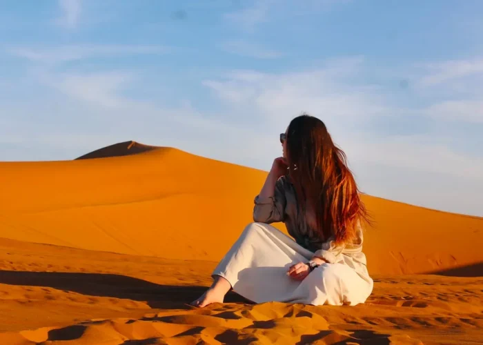 Merzouga Sahara desert camel trek Erg Chebbi dunes Morocco sunset