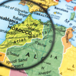 Where is Morocco? Beautiful view of Morocco featuring the Atlas Mountains, Sahara Desert, and historic cities.