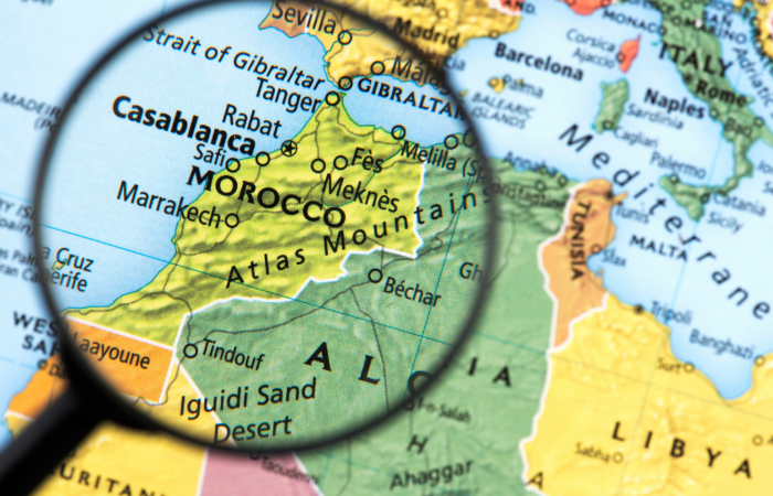 Where is Morocco? Beautiful view of Morocco featuring the Atlas Mountains, Sahara Desert, and historic cities.